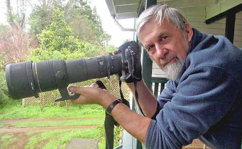Photographer Martin Jacka looking out for wildlife from his front verandah. Photographer Martin Jacka looking out for wildlife from his front verandah.